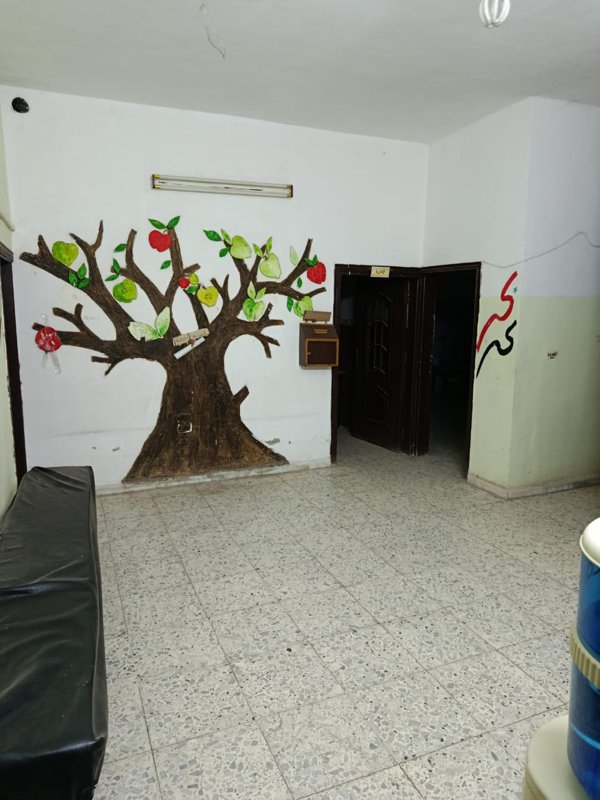 شقة ارضية ضمن بناء مستثمرة كمعهد تدريسي 